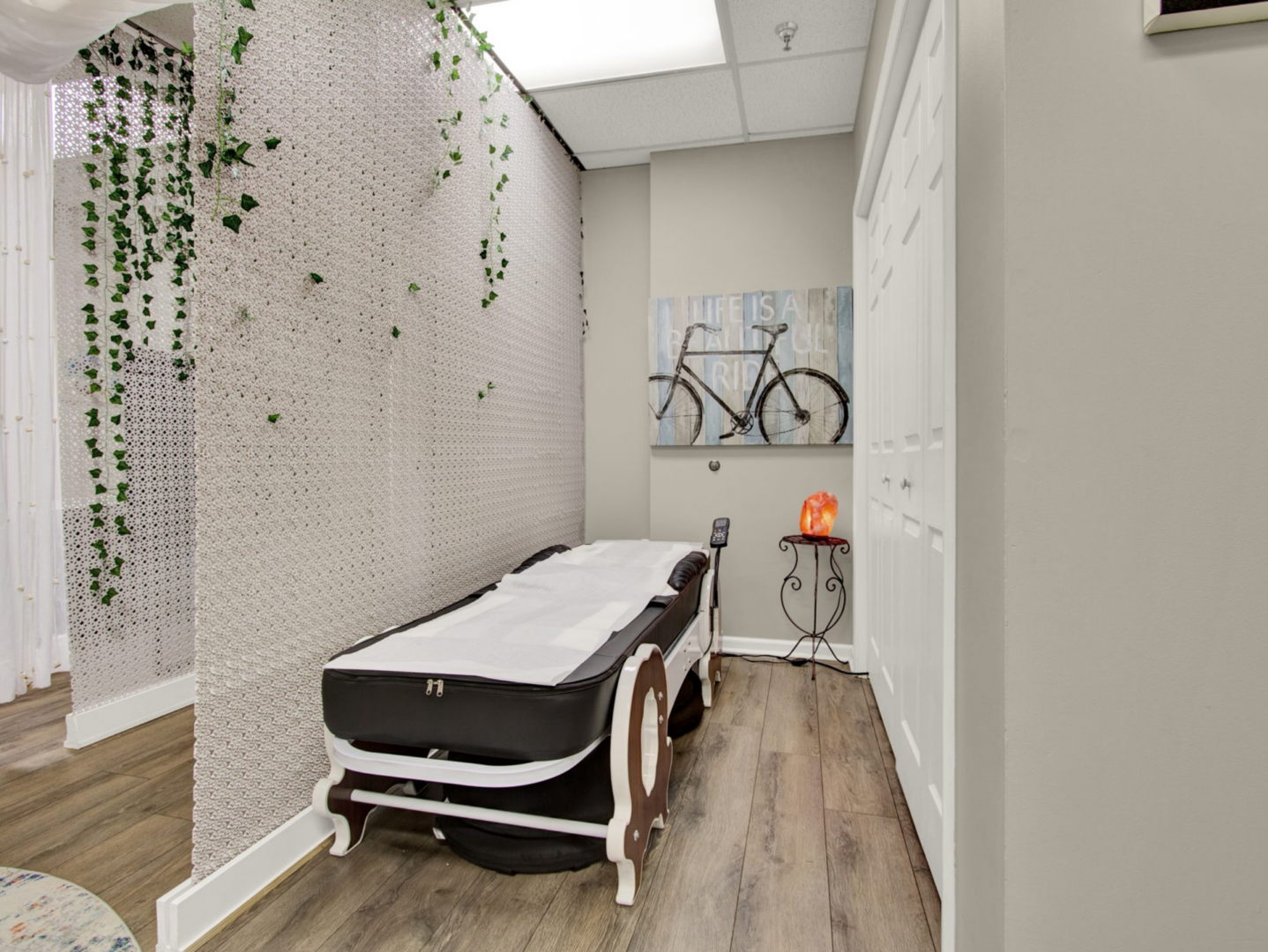 Massage room with decorative wall art